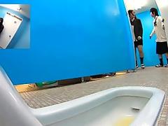 Young man and his twink friend jerking and stroking together